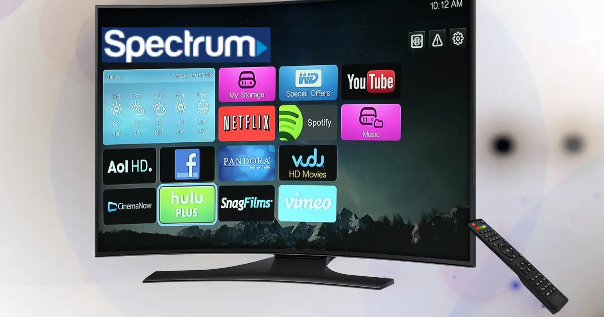 Smart TV displaying Spectrum TV app with logos for LG and VIZIO, showing app availability in a cozy living room setup